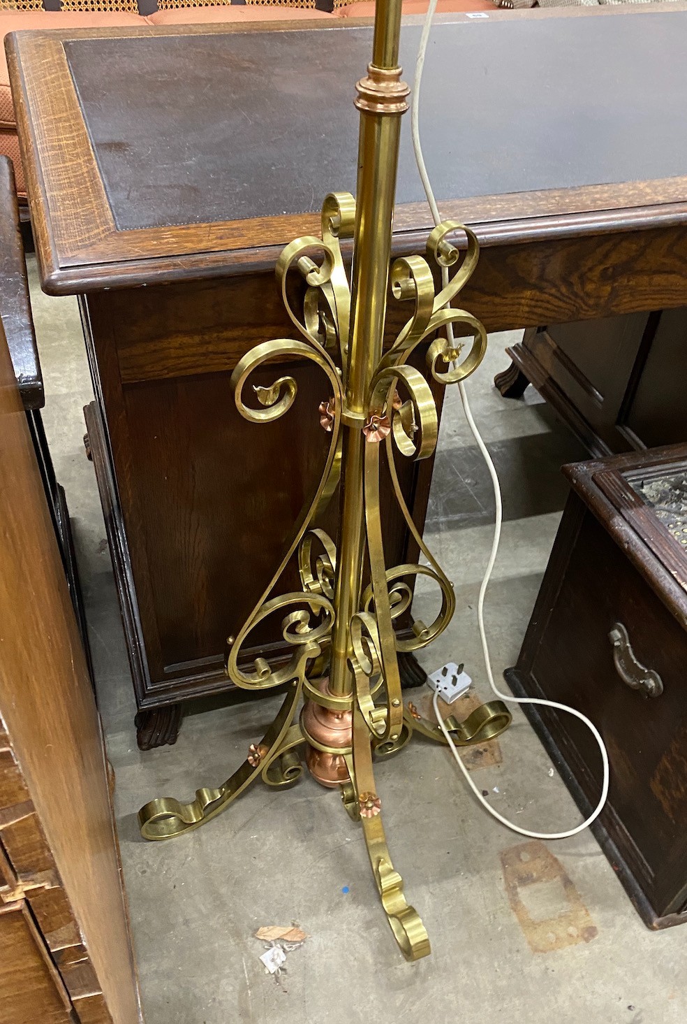 An Art Nouveau brass and copper telescopic oil standard lamp converted to electricity